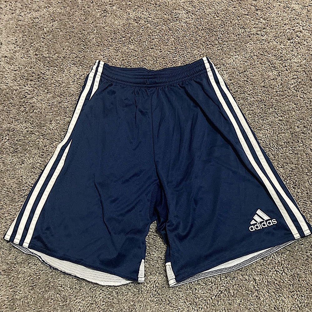 Adidas navy blue soccer shorts.